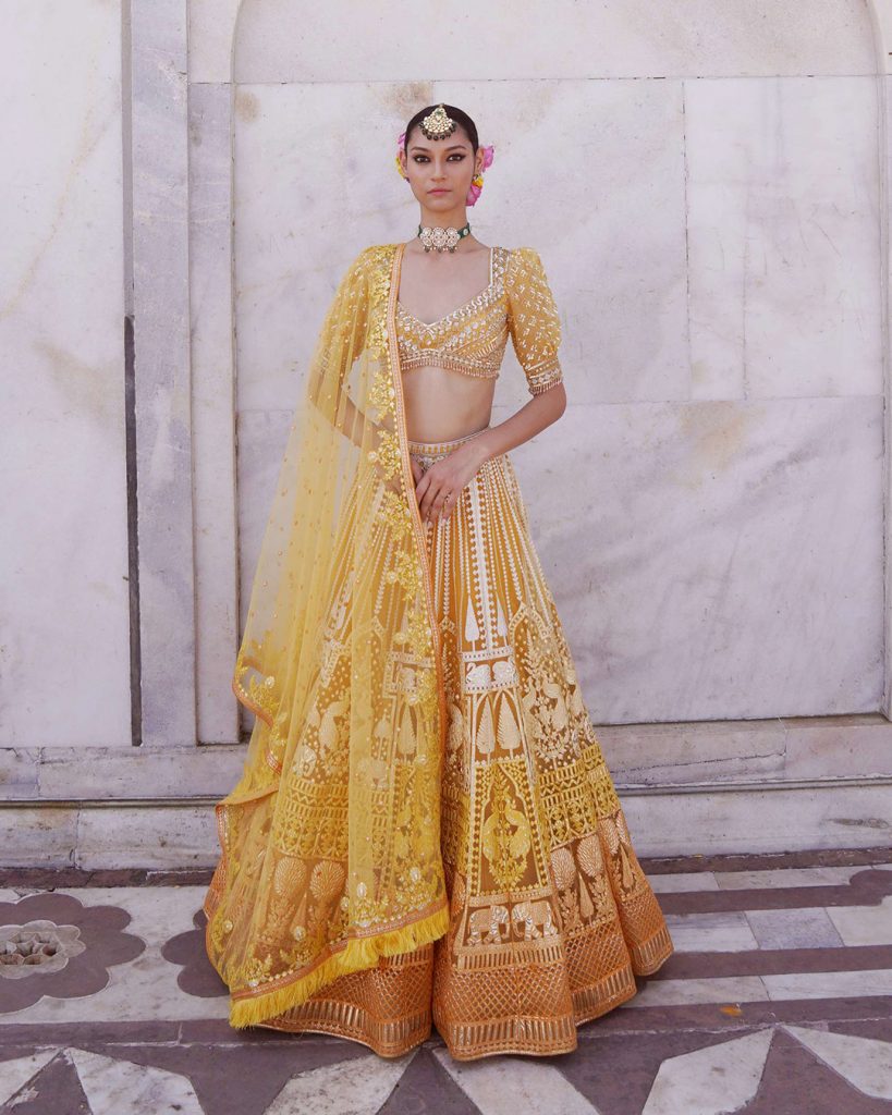 Photo of yellow and white lehenga