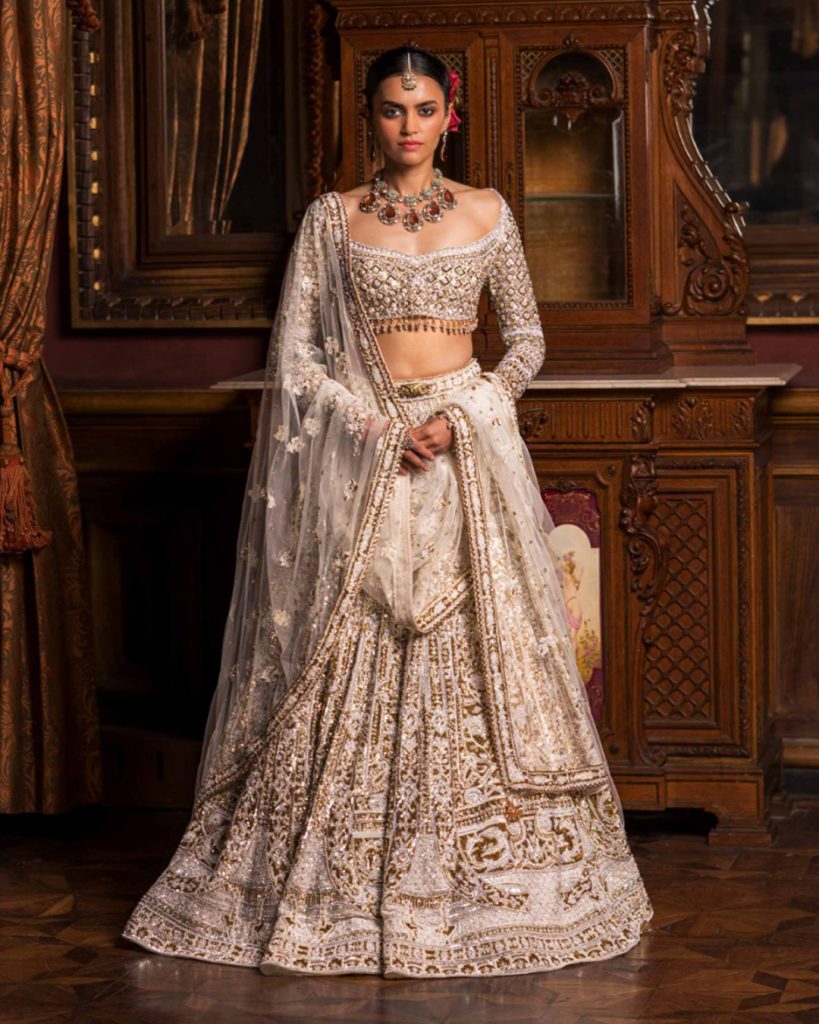 Celeste Ivory, Golden And Silver Lehenga Set