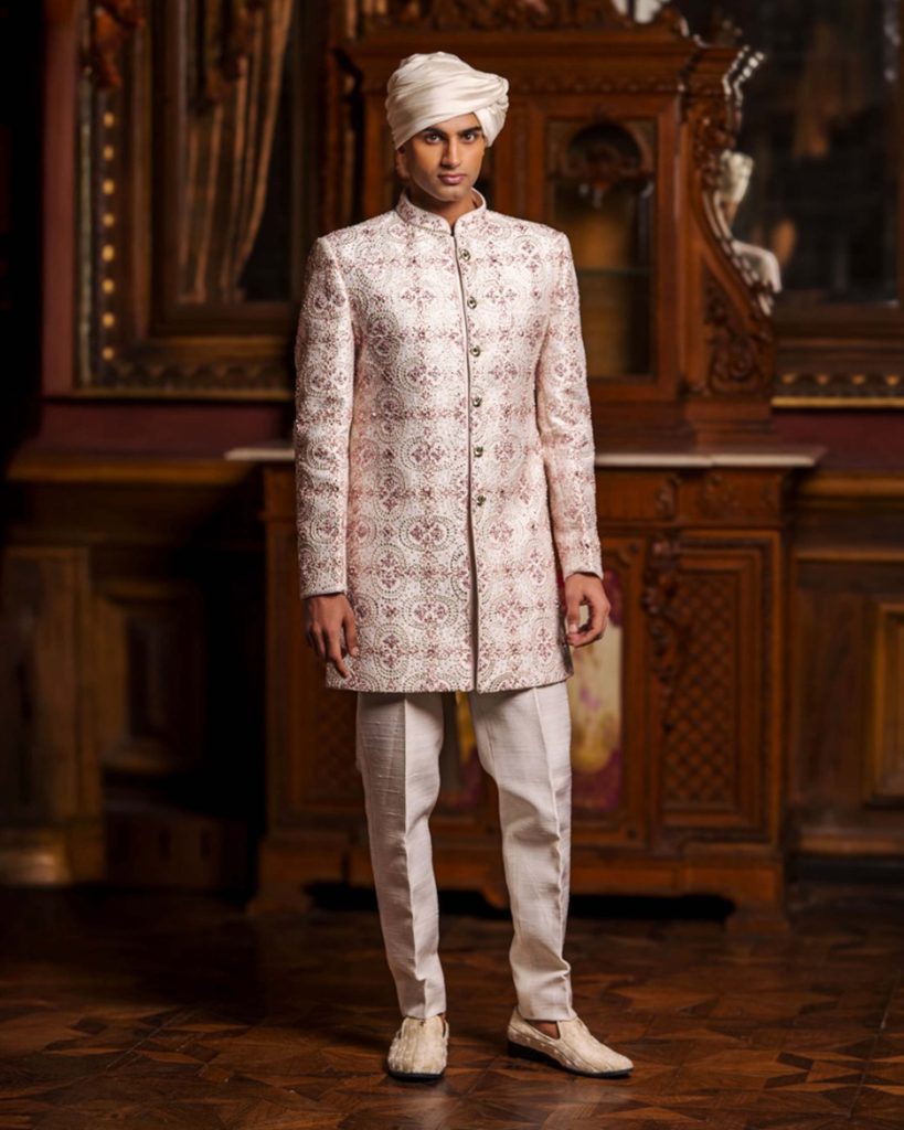 off-white and pink sherwani