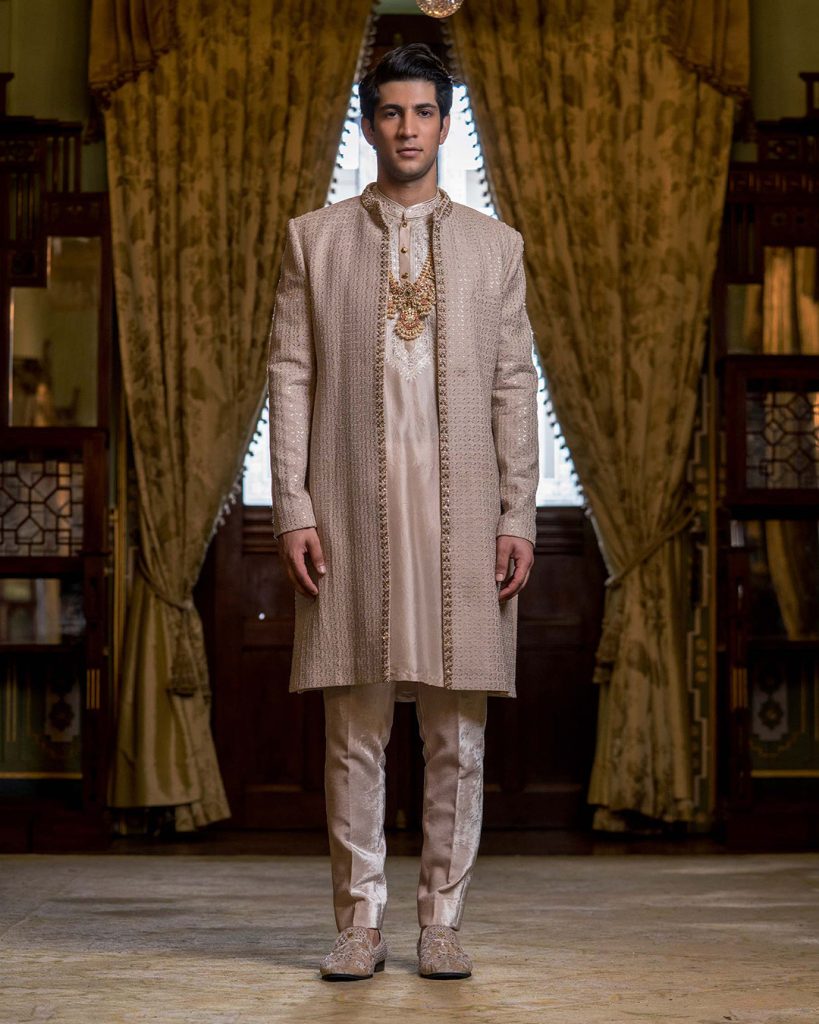 Groom in embroidered open-front sherwani for an engagement ceremony